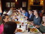 Picture of students and staff enjoying christmas lunch at the local pub